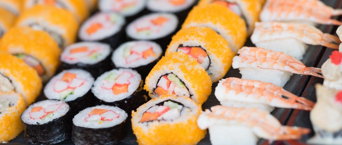 <h1> Various sushi rolls on a plate, sushi buffet </h1>